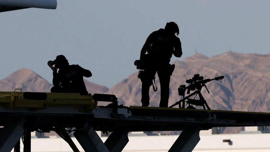 Members of the U.S. Secret Service Counter Sniper team stand guard near Air Force One at Harry Reid International Airport in Las Vegas, Nevada, U.S., July 15, 2024.