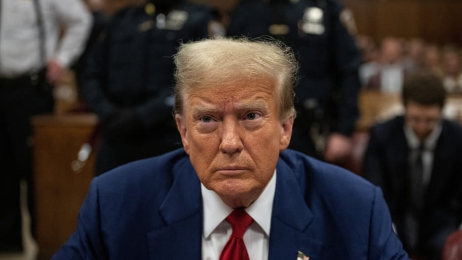 Former US President Donald Trump attends his trial for allegedly covering up hush money payments linked to extramarital affairs, at Manhattan Criminal Court in New York on April 30, 2024.