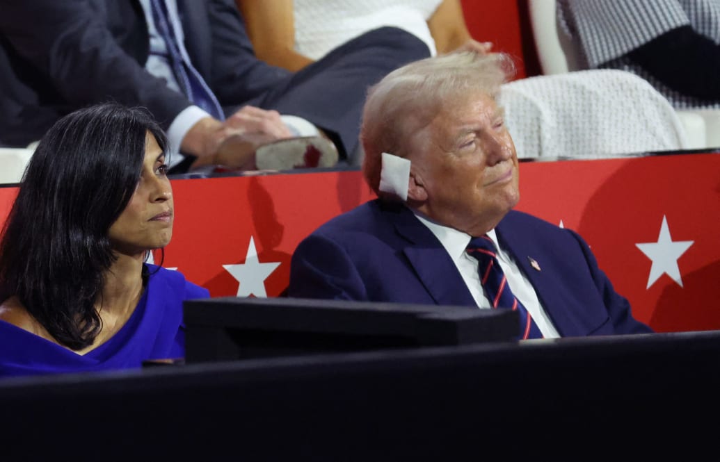 Usha Vance and Donald Trump listen as Vice Presidential Nominee Senator J.D. Vance speaks on Day 3 of the Republican National Convention