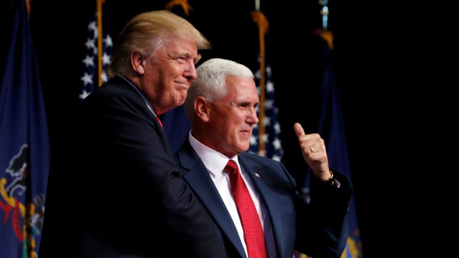Donald Trump shakes hands with Mike Pence at a campaign rally in Scranton, Pennsylvania, July 27, 2016.  