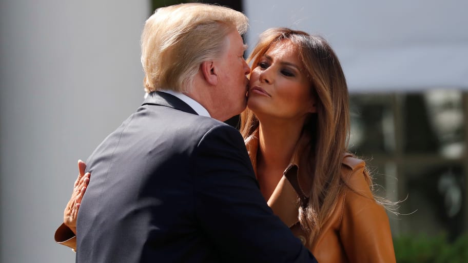 U.S. President Donald Trump kisses first lady Melania Trump
