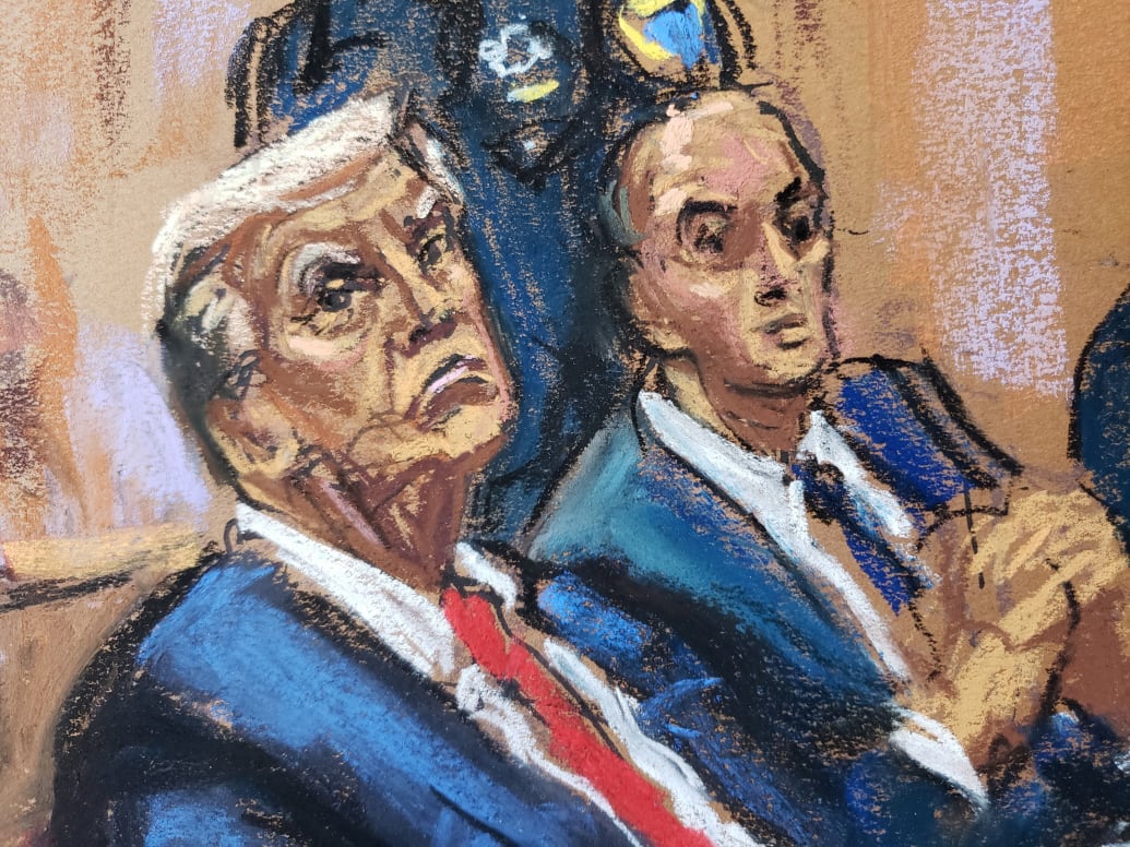 Donald Trump listens as his lawyer Todd Blanche (not seen) argues with Judge Juan Merchan (not seen) during a court hearing in New York, U.S., February 15, 2024 in this courtroom sketch.