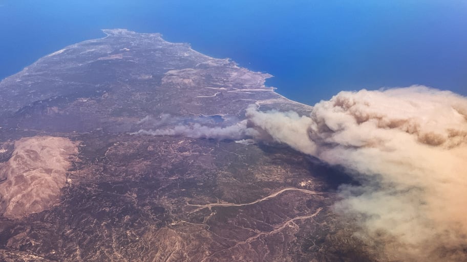 A wildfire spreads across the Greek island of Rhodes.