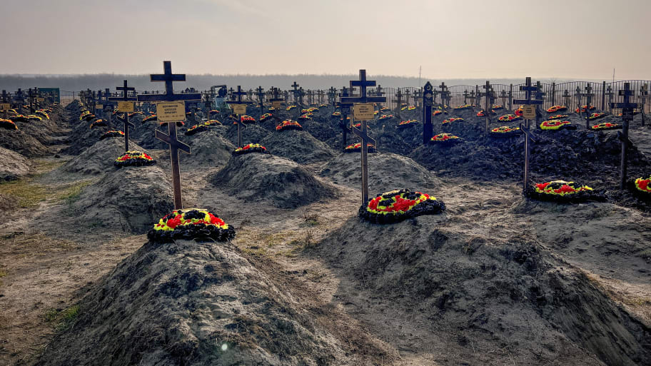 Graves of Russian Wagner mercenary group fighters are seen in a cemetery near the village of Bakinskaya