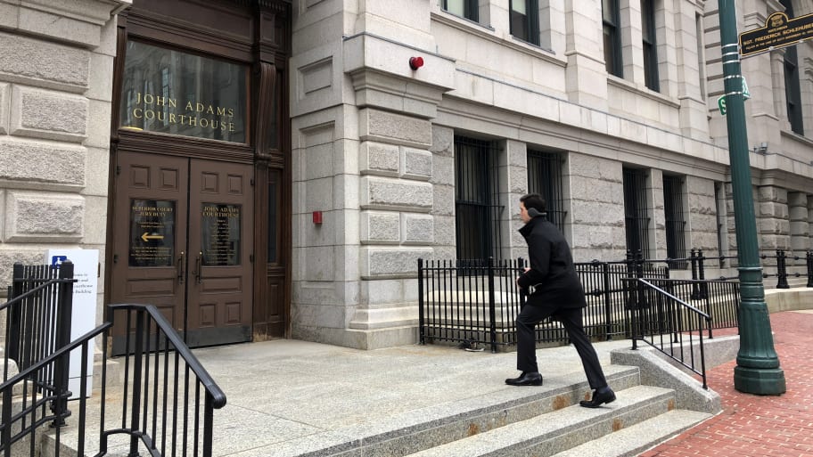 A man walks up to the John Adams Courthouse, which houses the Massachusetts Supreme Judicial Court in Boston, Massachusetts, March 6, 2018.
