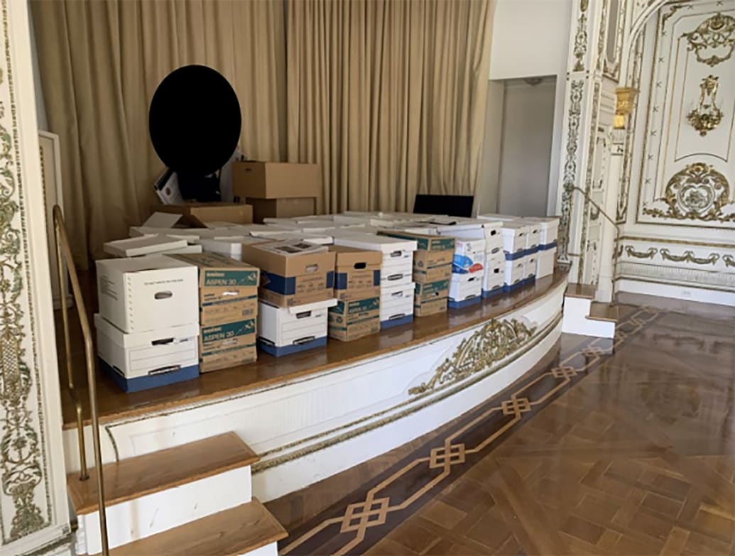 Boxes of documents stacked in the White and Gold Ballroom of former President Donald Trump's Mar-a-Lago estate.