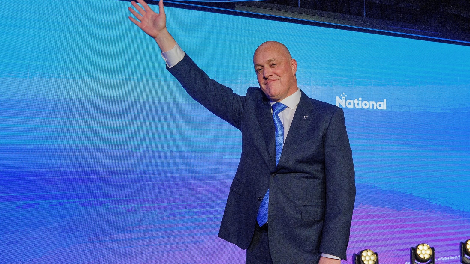 Christopher Luxon,  leader of  New Zealand's National Party waves to supporters at his election party.