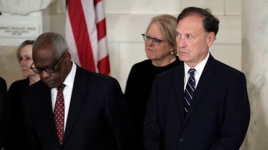 Supreme Court Justice Clarence Thomas and Justice Samuel Alito attend a private ceremony for retired Supreme Court Justice Sandra Day O’Connor before public repose in the Great Hall at the Supreme Court in Washington, Monday, Dec. 18, 2023. 