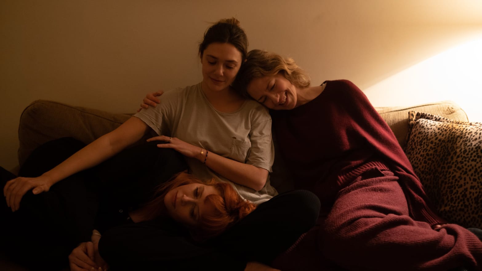 A photo still of Natasha Lyonne, Elizabeth Olsen, and Carrie Coon in 'His Three Daughters'