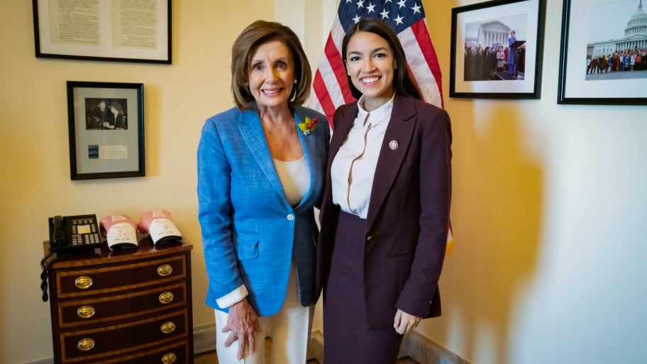 U.S. Speaker of the House Nancy Pelosi (D-CA) poses with Rep. Alexandria Ocasio-Cortez (D-NY) in a photo released by her office after they met in the Speaker's office at the U.S. Capitol