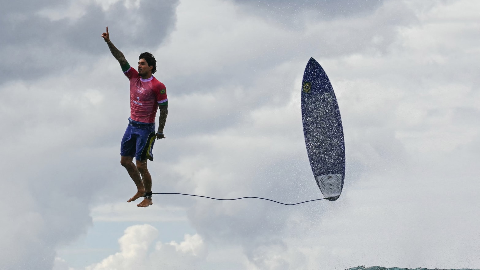 Gabriel Medina celebrating after perfect wave.