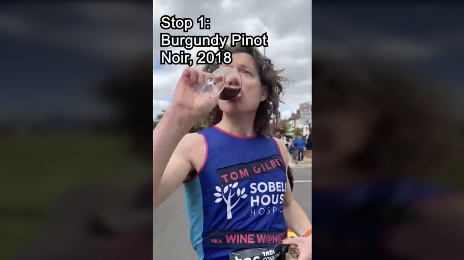 marathoner tom gilbey taste tests his first glass of wine of 25 at the London marathon on Sunday, april 21, in London, United Kingdom.