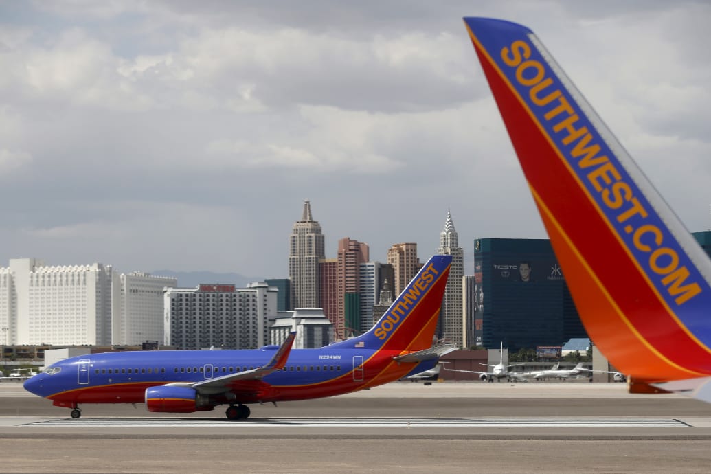 Southwest Airlines Boeing 737-700 planes are seen in front of the Las Vegas strip.