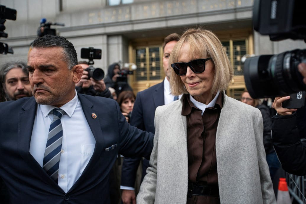 E. Jean Carroll exits the Manhattan Federal Court in New York Wednesday after testifying in her civil rape case against former President Donald Trump.