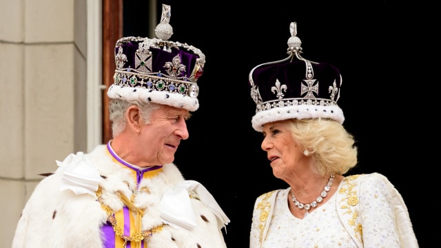 King Charles III and Queen Camilla on the balcony of Buckingham Palace during the Coronation on May 6, 2023.