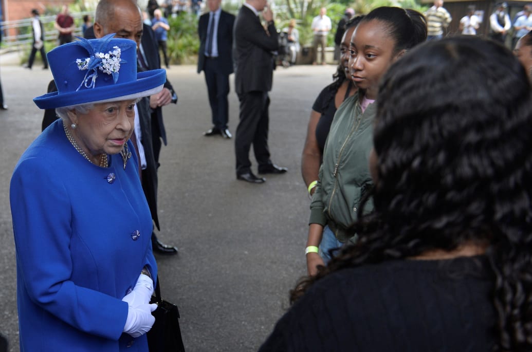 Queen Elizabeth meets residents of the Grenfell Tower block near the scene of the fire that destroyed the block, in north Kensington, West London, Britain June 16, 2017.