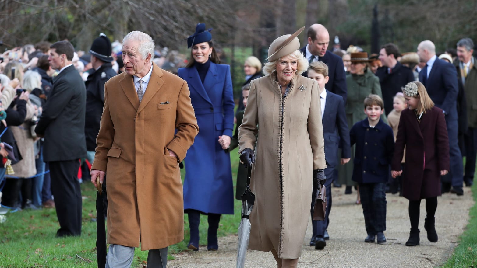 Britain's King Charles, Queen Camilla, William, Prince of Wales, Catherine, Princess of Wales, Prince George, Princess Charlotte, Prince Louis and Mia Tindall arrive to attend the Royal Family's Christmas Day service at St. Mary Magdalene's church, 2023.