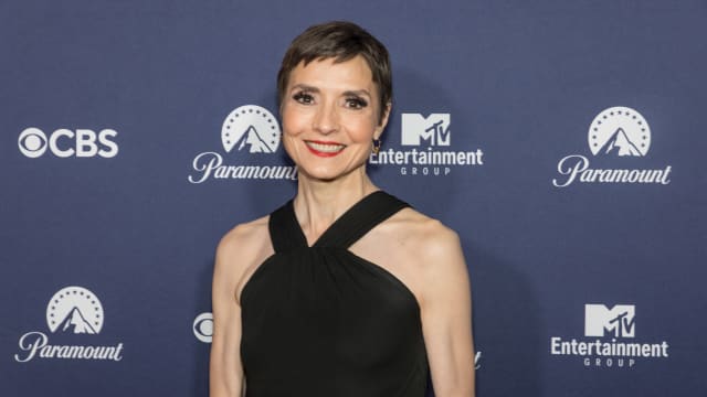Catherine Herridge poses for a picture in front of a Paramount backdrop.