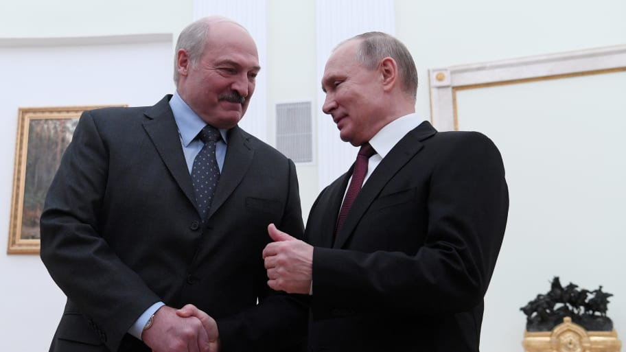 Russian President Vladimir Putin (R) shakes hands with his Belarussian counterpart Alexander Lukashenko during a meeting in Moscow, Russia December 29, 2018.