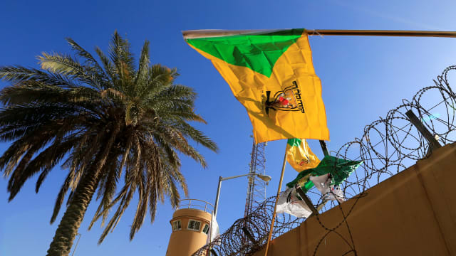 Kataib Hezbollah militia group flag.
