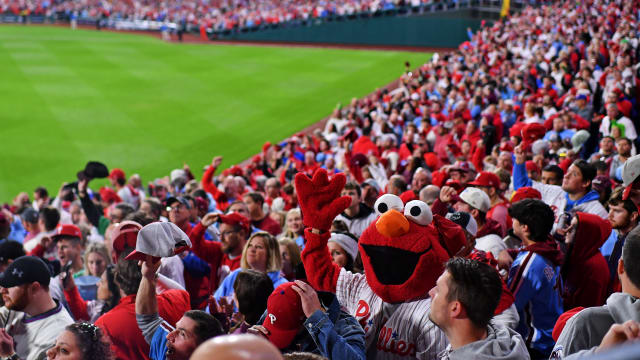 Phillies fans pack into the stands for a playoff baseball game.