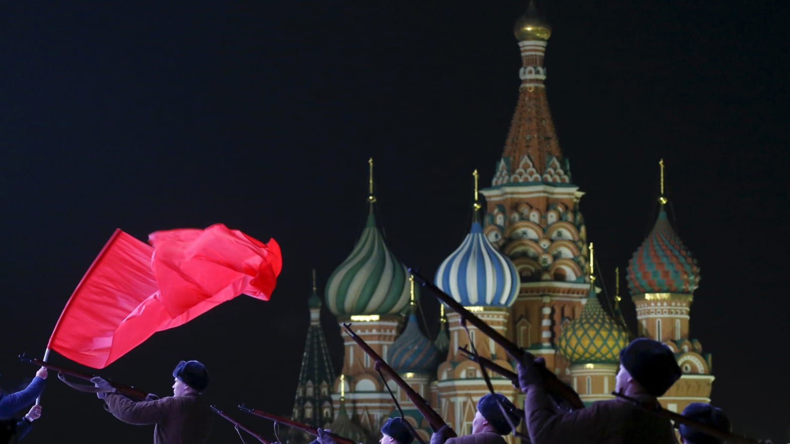 Russian servicemen, dressed in historical uniforms, take part in a military parade in Red Square.