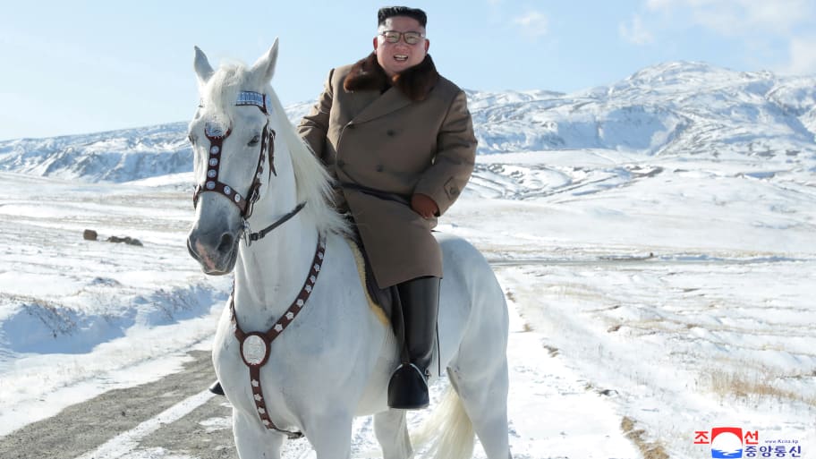 North Korean leader Kim Jong Un rides a horse during snowfall in Mount Paektu in this image released by North Korea's Korean Central News Agency. 