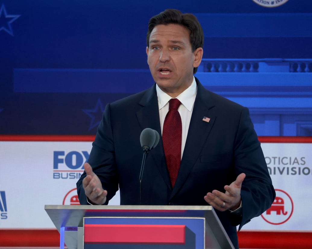 A close of up Ron DeSantis on stage at the GOP debate