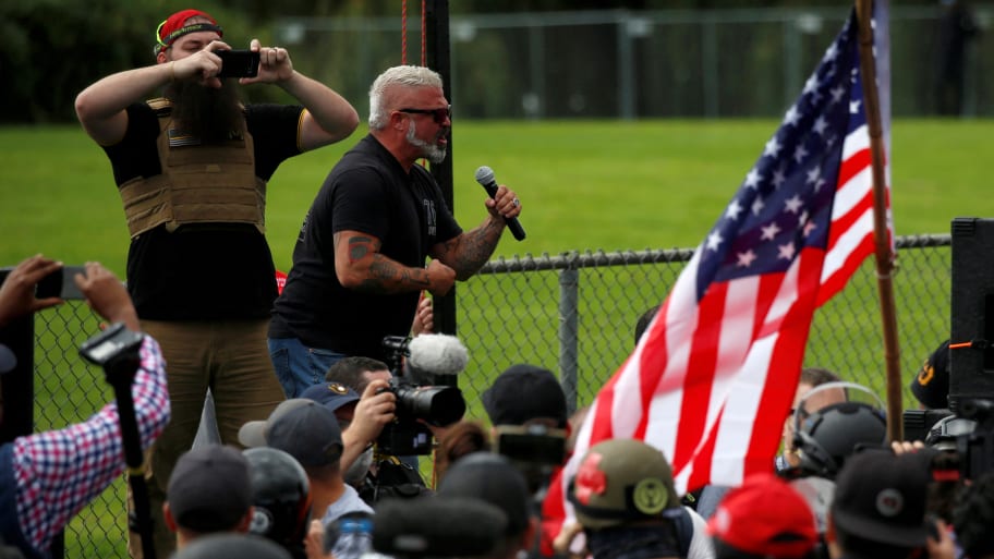 Proud Boys member Joe Biggs speaks during a rally in Portland, Oregon, Sept. 26, 2020.