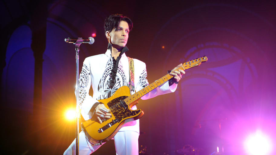 The Artist Formerly Known As Prince performing on stage.