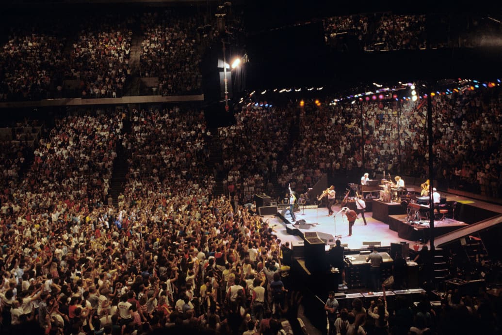 Bruce Springsteen and the East Street Band performing at the Brendan Byrne Arena in East Rutherford, New Jersey on August 11, 1984. 
