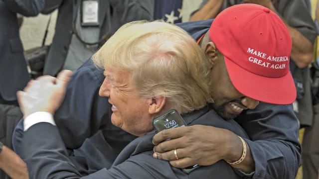 Kanye West embraces real estate developer and US President Donald Trump