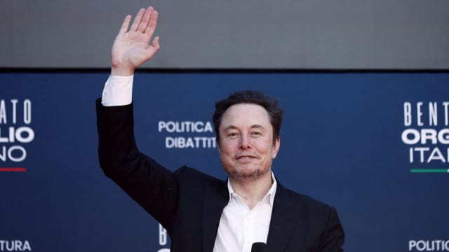 Tesla and SpaceX's CEO Elon Musk gestures, as he attends political festival Atreju organised by Italian Prime Minister Giorgia Meloni's Brothers of Italy (Fratelli d'Italia) right-wing party, in Rome,