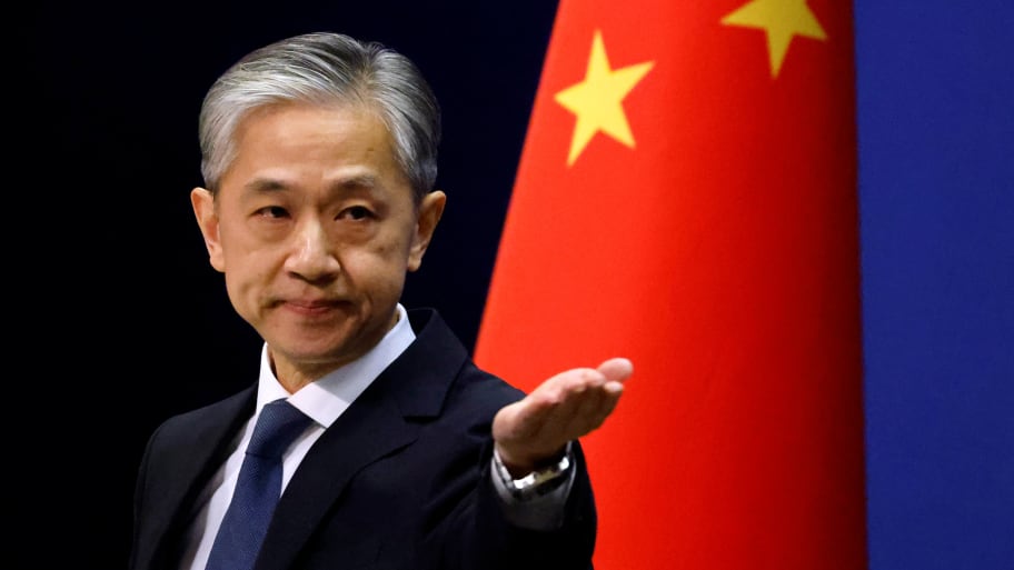 Chinese Foreign Ministry spokesman Wang Wenbin attends a news conference in Beijing, China December 14, 2020.