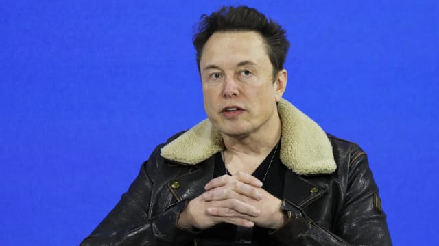 C.E.O. of Tesla, Chief Engineer of SpaceX and C.T.O. of X Elon Musk speaks during the New York Times annual DealBook summit on November 29, 2023 in New York City. 