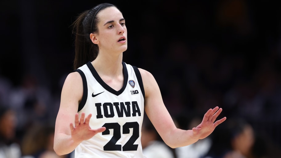Caitlin Clark #22 of the Iowa Hawkeyes reacts in the second half during the NCAA Women's Basketball Tournament Final Four semifinal game against the UConn Huskies