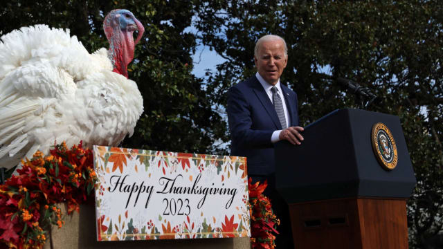 Joe Biden pardons the National Thanksgiving Turkey, Liberty, during the annual ceremony on the South Lawn at the White House