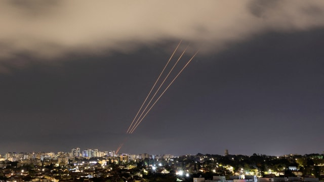 An anti-missile system operates after Iran launched drones and missiles towards Israel, as seen from Ashkelon, Israel.