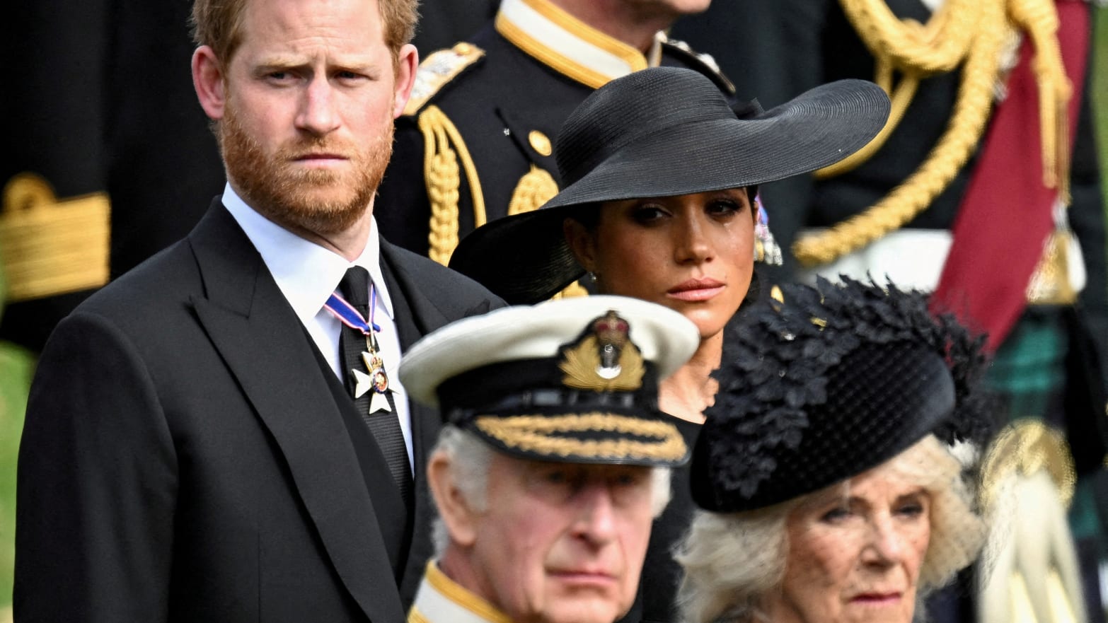 Prince Harry, Meghan Markle, King Charles and Queen Camilla at the state funeral and burial of Britain's Queen Elizabeth, Sept. 19, 2022.