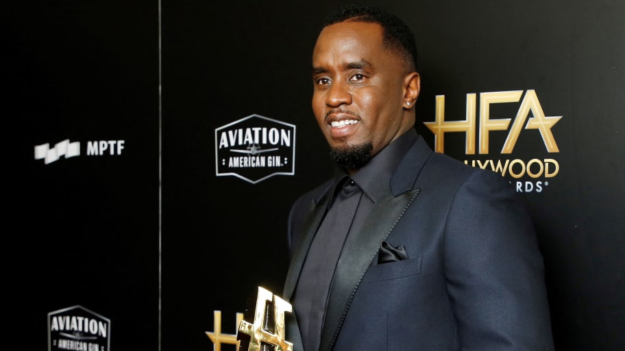 Sean Combs with his Hollywood Documentary Award for 'Can't Stop, Won't Stop: A Bad Boy Story'.