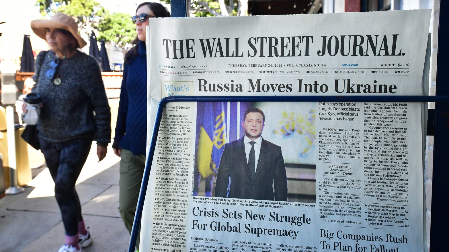 A copy of The Wall Street Journal on a newsstand.
