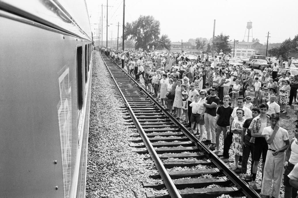 Crowds looking at RFK's funeral train, seen from the train