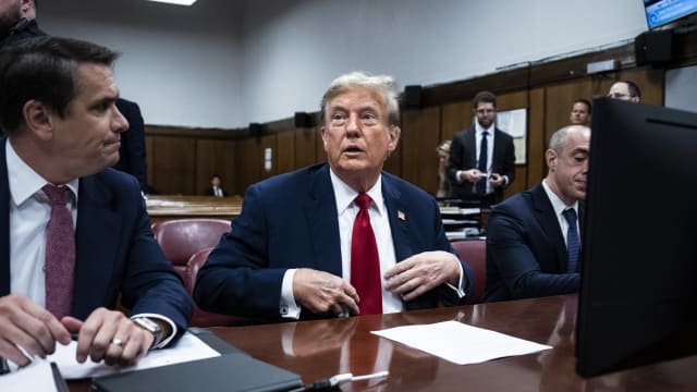 Former President Donald Trump appears with his legal team Todd Blanche, and Emil Bove ahead of the start of jury selection at Manhattan Criminal Court.