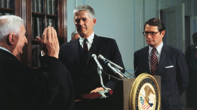 Archibald Cox sworn in as Special Watergate Prosecutor by Judge Charles Fahy of the District of Columbia Circuit Court with Attorney General Elliot Richardson witnessing