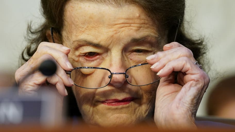 U.S. Senator Dianne Feinstein (D-CA) puts on her glasses during a Senate Judiciary Committee executive business meeting to vote on legislation and pending nominations before the committee, on Capitol Hill in Washington, U.S., May 11, 2023.