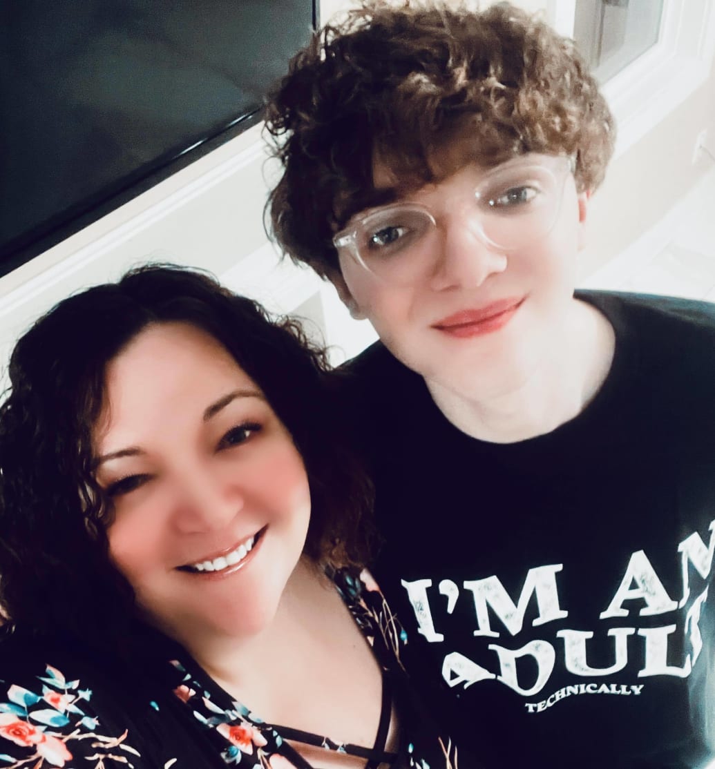 Brandi Crawford pictured with her son, Thomas, who is also listed as a plaintiff in the class-action suit.