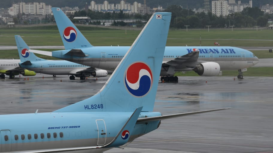 Korean Air planes are parked on the tarmac ahead of the arrival of Typhoon Maysak at Gimpo domestic airport in Seoul on September 2, 2020.