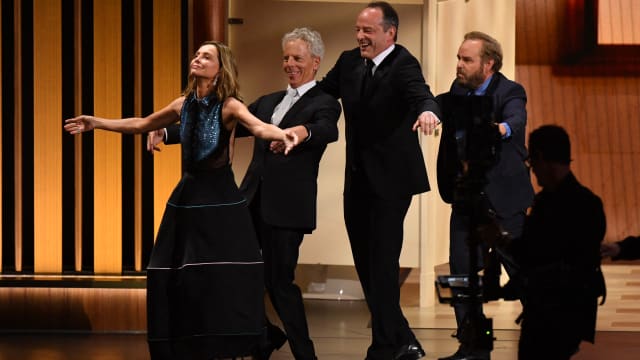 Calista Flockhart, Greg Germann, Gil Bellows, and Peter MacNicol dancing at the Emmy Awards