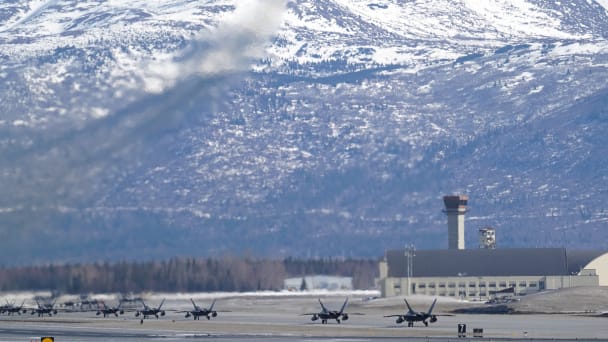 U.S. Air Force F-22 Raptor fighters participate in a close formation taxi, known as an Elephant Walk during the two-week Polar Force exercise at Joint Base Elmendorf-Richardson, Alaska, U.S.