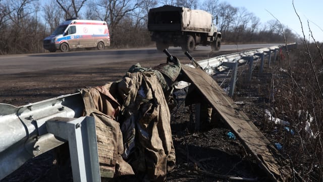 A stretcher and discarded Ukrainian military equipment on a roadside not far from Bakhmut.